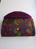 Cheneso: Dark Blue and Orange African Print Clutch Bag