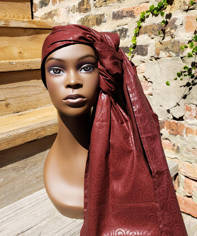 Chichewa: Brown Wax African Head Wrap With Spiral Detail