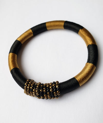 Issa VI: White/Black and Gold Bead andThread Bracelet