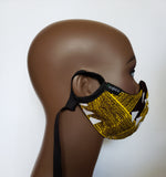Yoofi: Kid's Combo Tie Back and Adjustable Ear Loop Filter Pocket Brown Gold and White African Print Face Mask